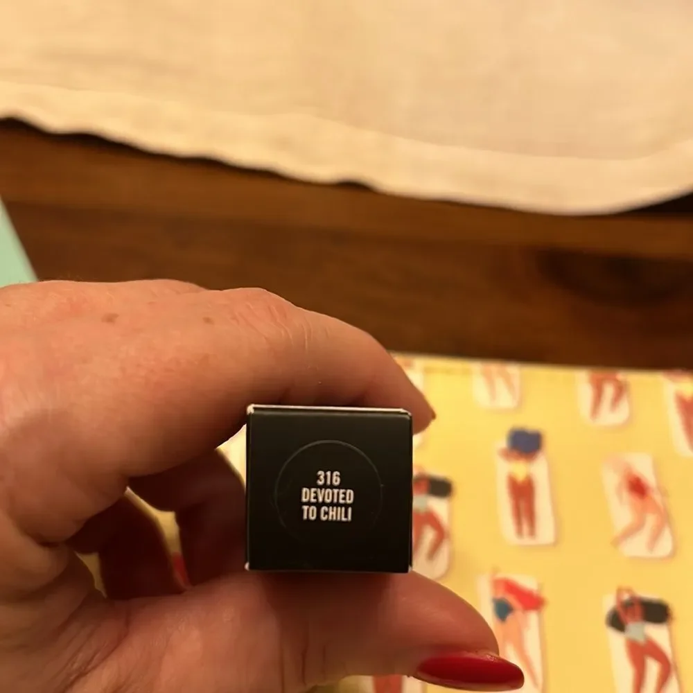 Mac Powder Kiss Lipstick devoted to chili is the color new in the box Ipsy bag